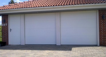 Ledhejseporte med dør - garageporte af høj kvalitet